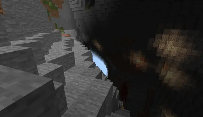 ALT text Massive mimic lurks in dark cave.