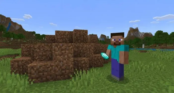 Player holding diamond near dirt blocks
