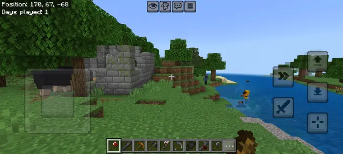 Ruined stone structure near forest and water