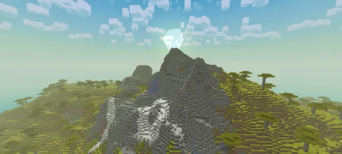 Blocky savanna mountains under bright sky