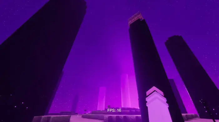 Vivid purple sky with tall dark pillars