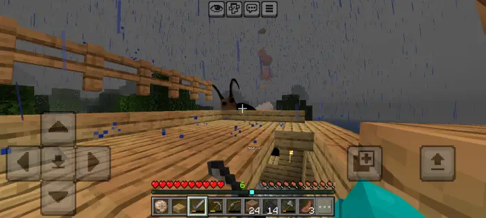 Player faces eerie creature on rainy deck.