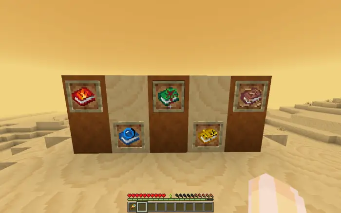 Four unique items displayed in desert sand