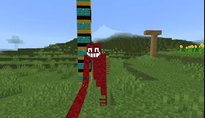 Giant red mimic creature with wide grin